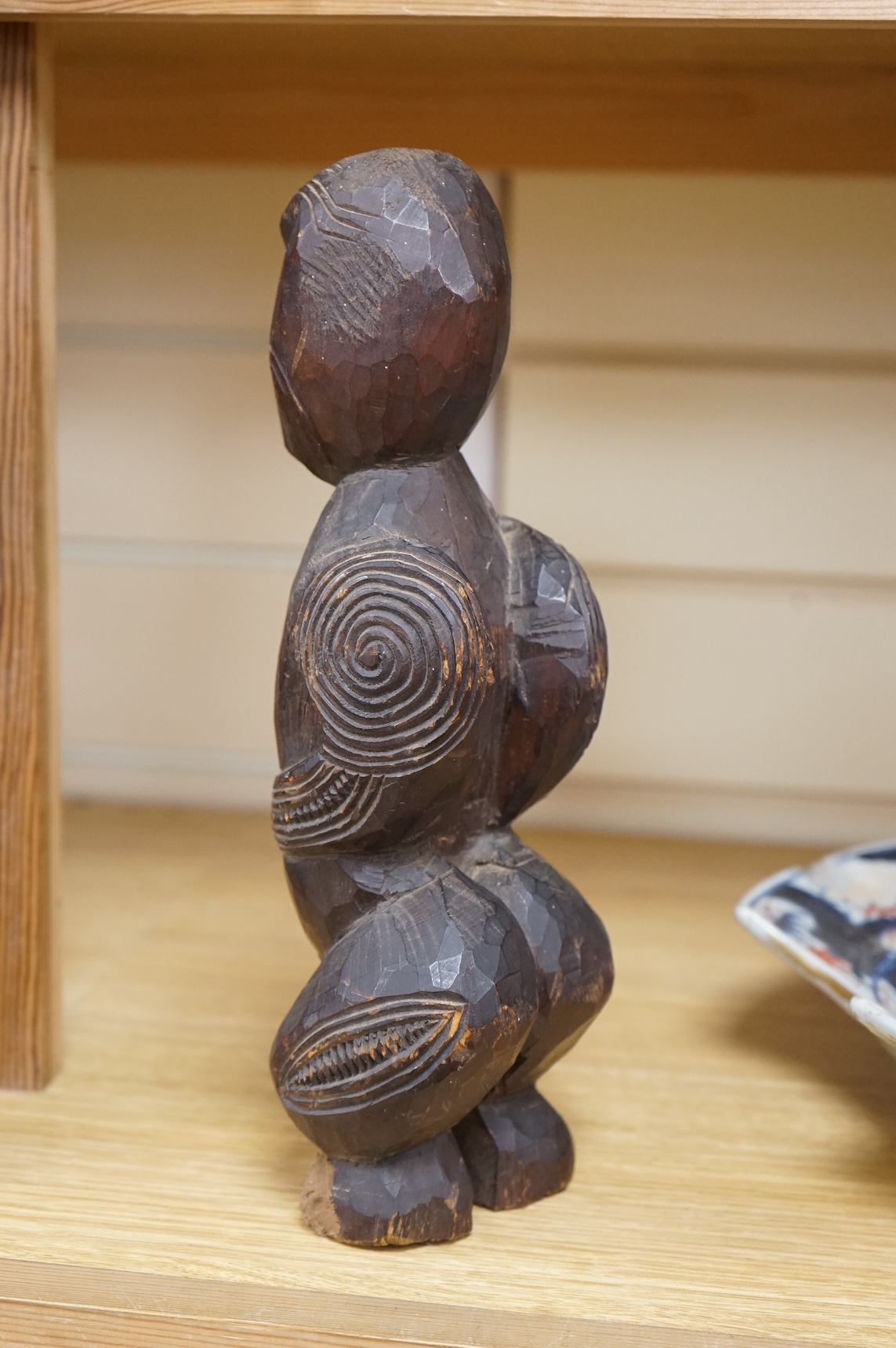 Three wood tribal figures, Africa, South Seas, tallest 37.5cm